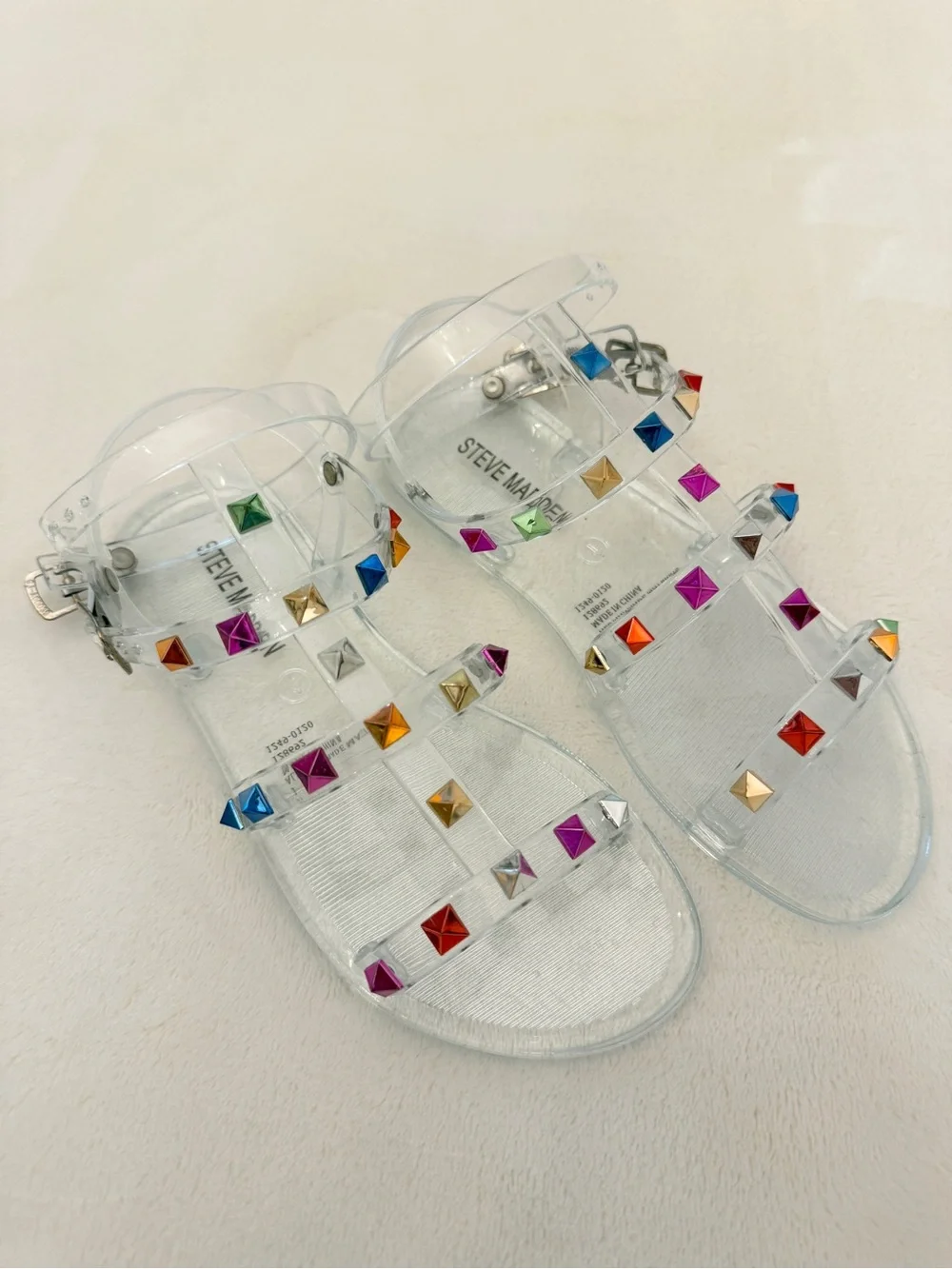 Steve Madden Clear Jelly Sandals with Multicolor Pyramid Studs
